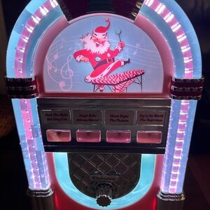 Mr. Christmas Retro Jukebox with Santa Design lights plays music